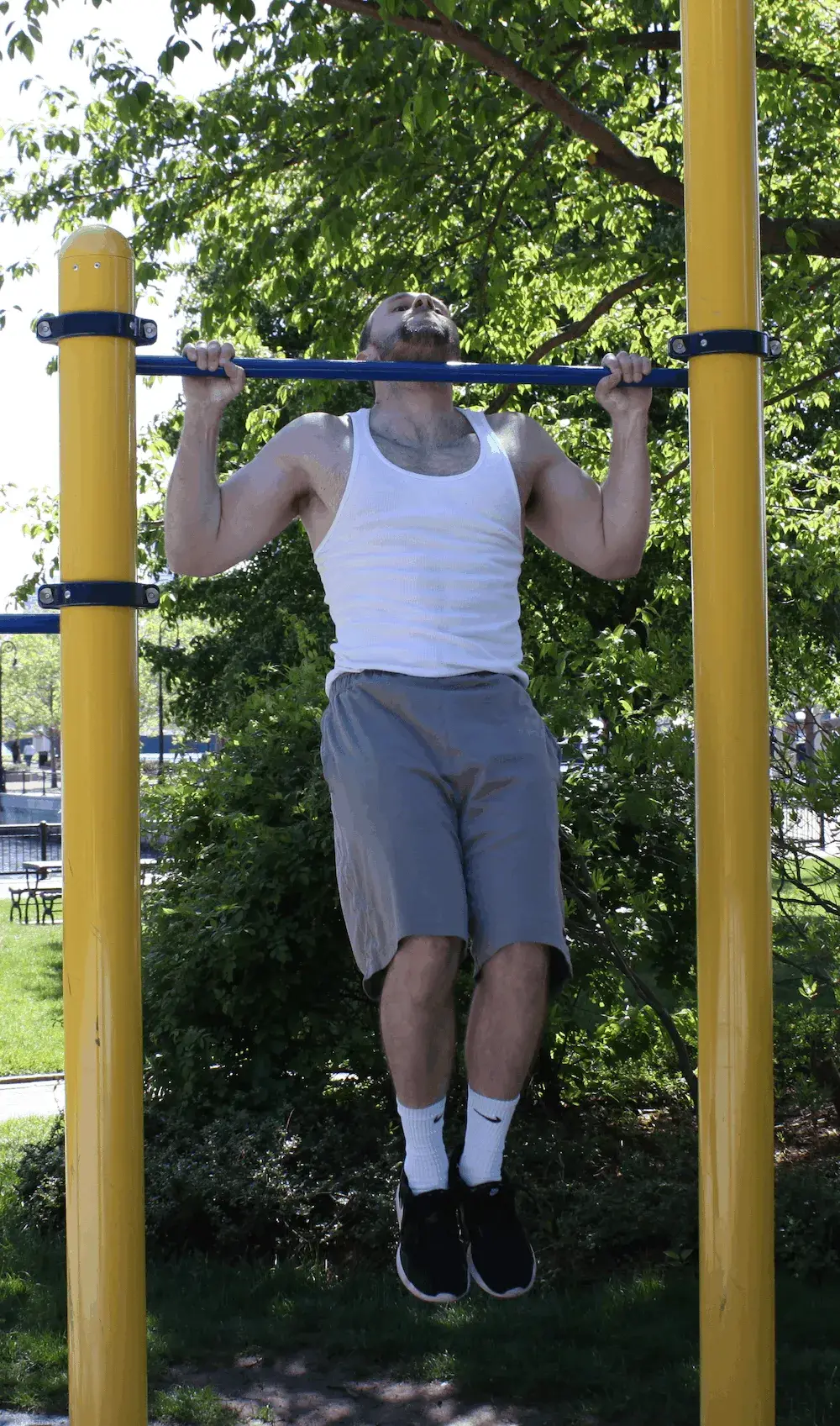 Coast Guard recruits doing pullups during basic training